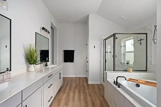 a bedroom with a bed and a mirror