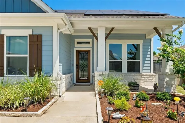 a view of a entryway door front of house