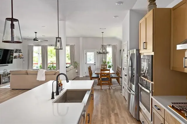 a front view of a house with a yard table and chairs