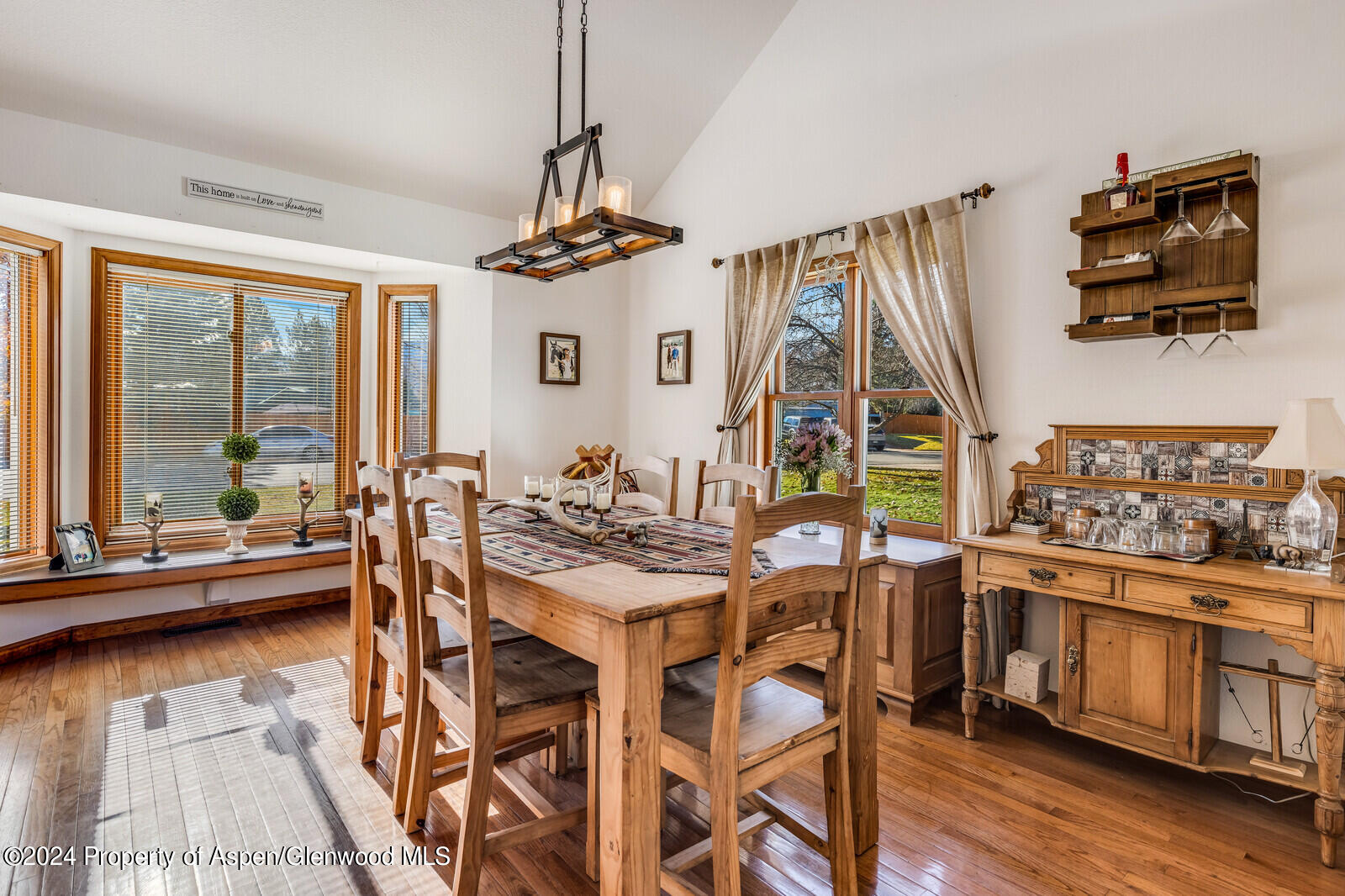 176 Rabbit Road Carbondale, CO 81623 - Photo 20 of 29 a view of a dining room with furniture window and wooden floor
