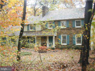 1231 North Ridge Road Perkasie, PA 18944 - Photo 1 of 6 a front view of a house with garden