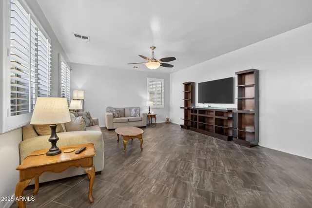 a bathroom with a sink toilet and mirror