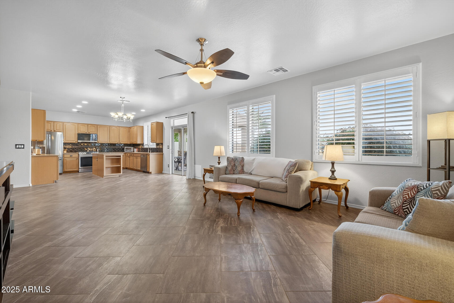28305 North Desert Native Street San Tan Valley, AZ 85143 - Photo 28 of 81 a living room with furniture and a large window