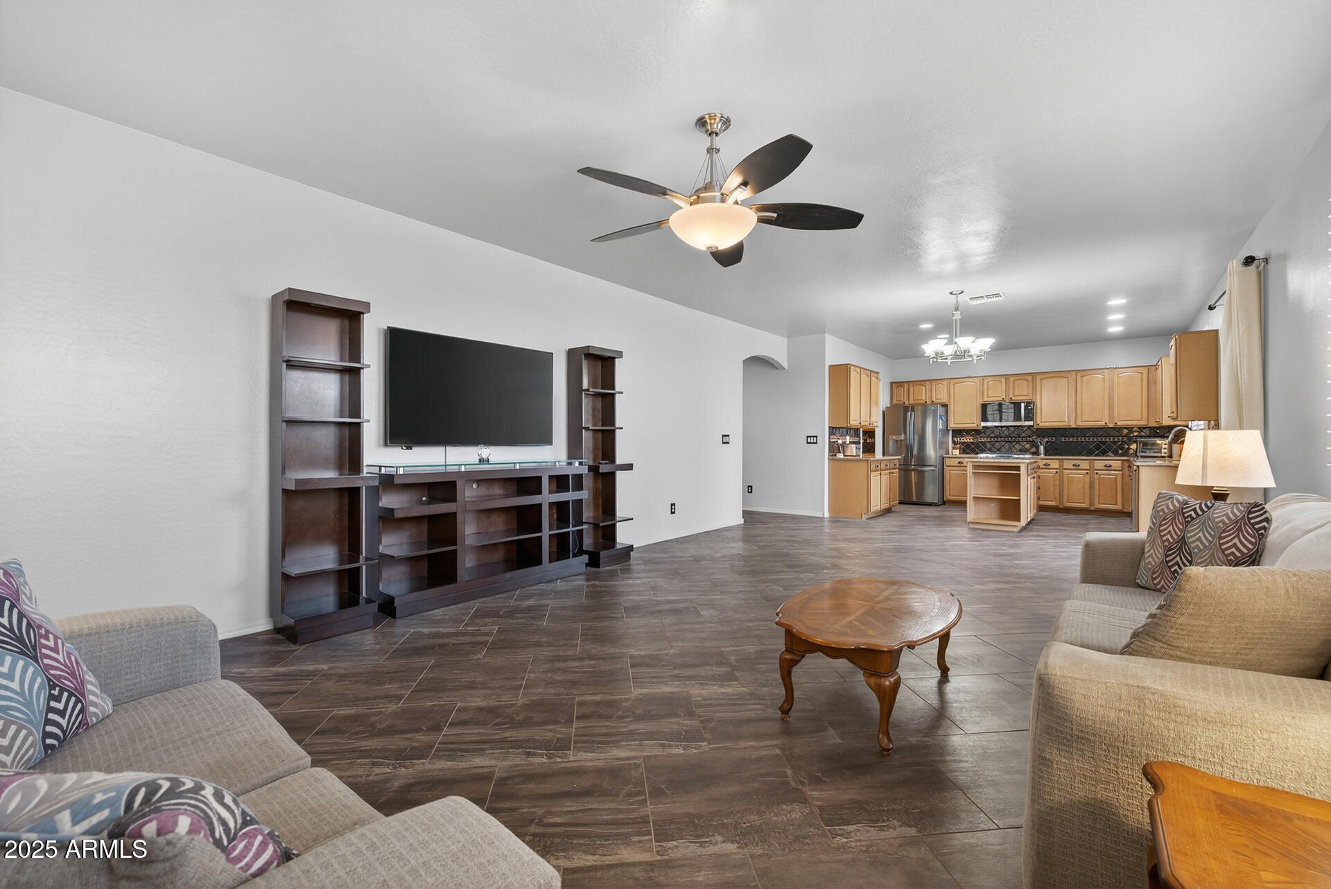 28305 North Desert Native Street San Tan Valley, AZ 85143 - Photo 29 of 81 a living room with furniture and a flat screen tv