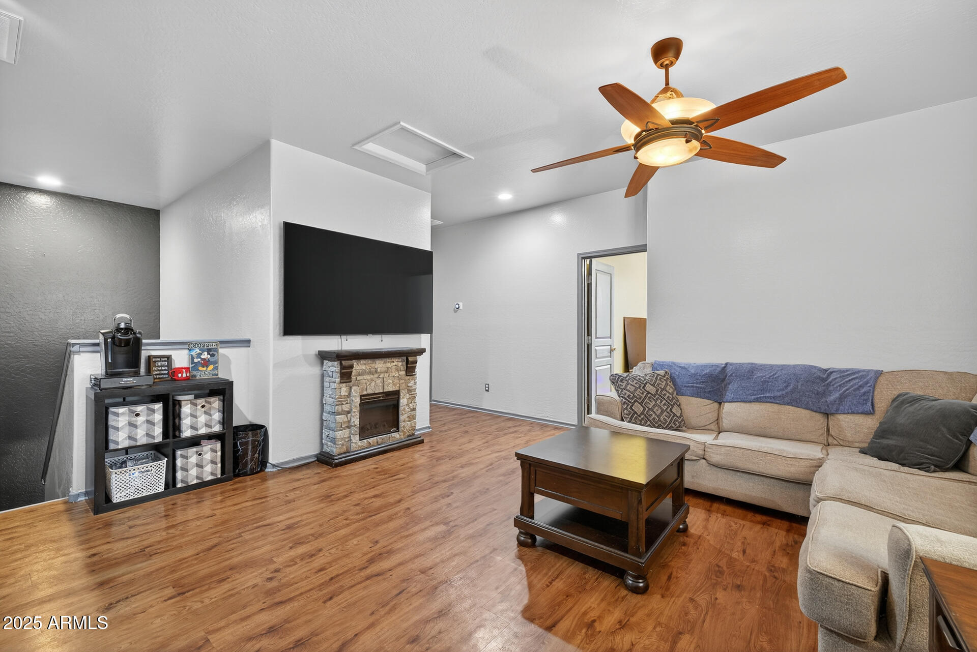 28305 North Desert Native Street San Tan Valley, AZ 85143 - Photo 31 of 81 a living room with furniture and a flat screen tv