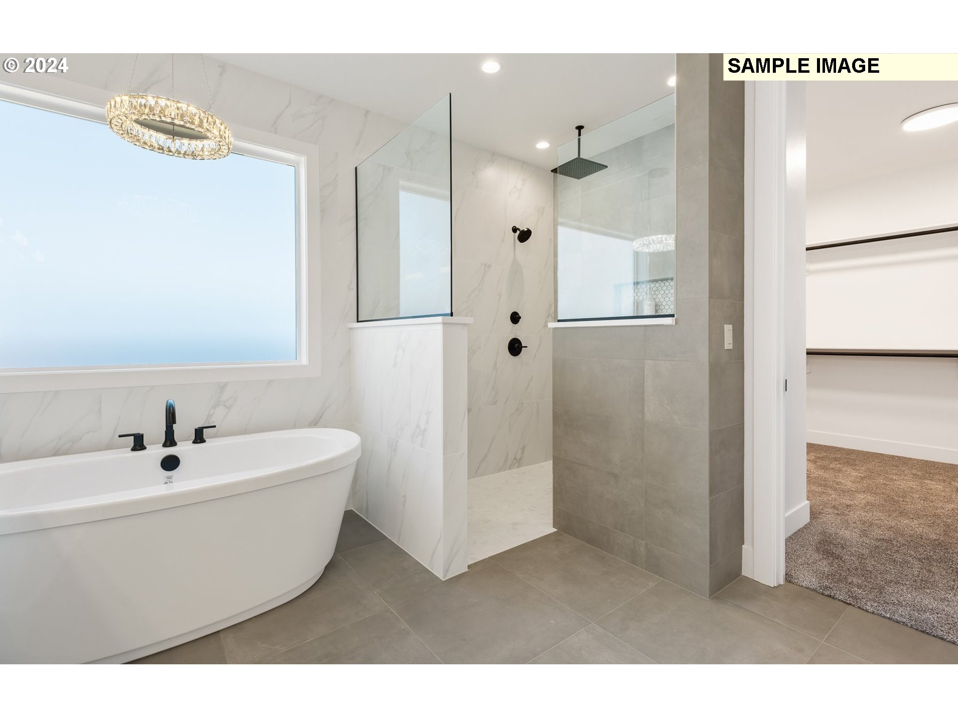 Northeast 178th Circle, Unit LOT11 Ridgefield, WA 98642 - Photo 23 of 30 a bathroom with a white tub shower and vanity