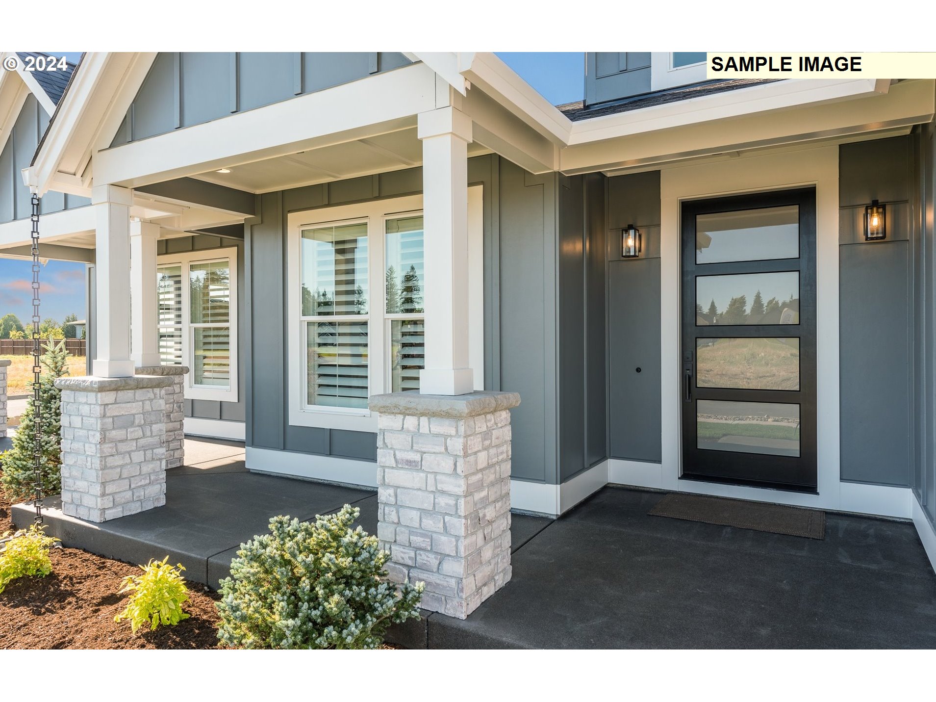 Northeast 178th Circle, Unit LOT11 Ridgefield, WA 98642 - Photo 4 of 30 a front view of a house with a garage