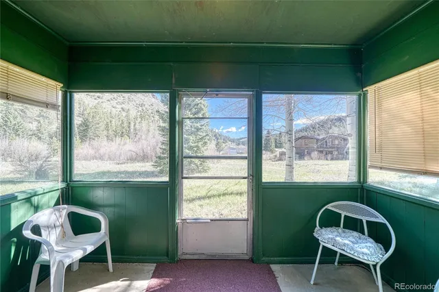 a view of a field with an trees