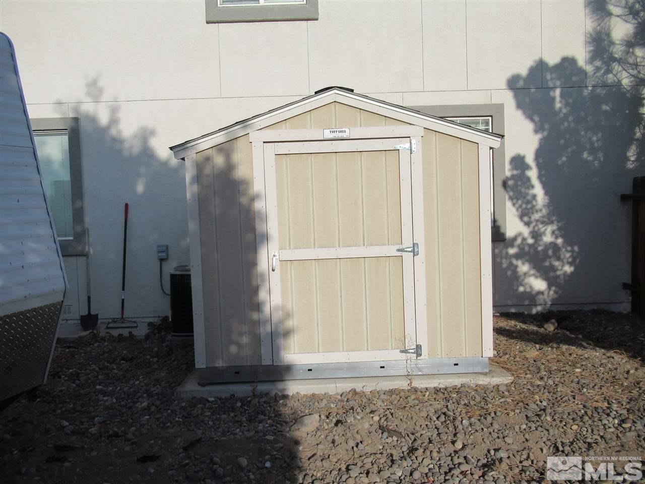 2347 Clementine Lane Reno, NV 89521 - Photo 18 of 19 a front view of a house with garden