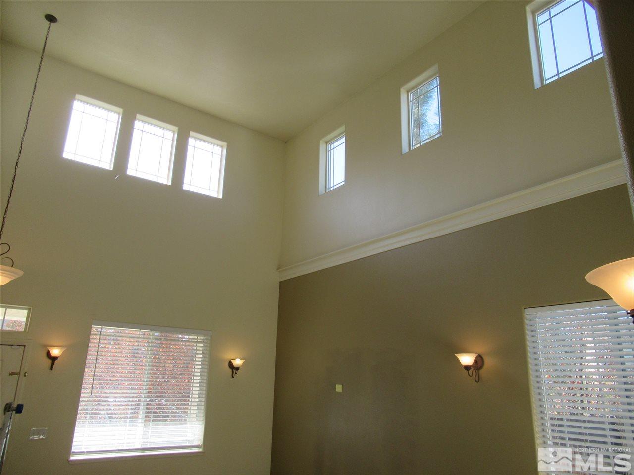 2347 Clementine Lane Reno, NV 89521 - Photo 4 of 19 a view of an empty room with windows