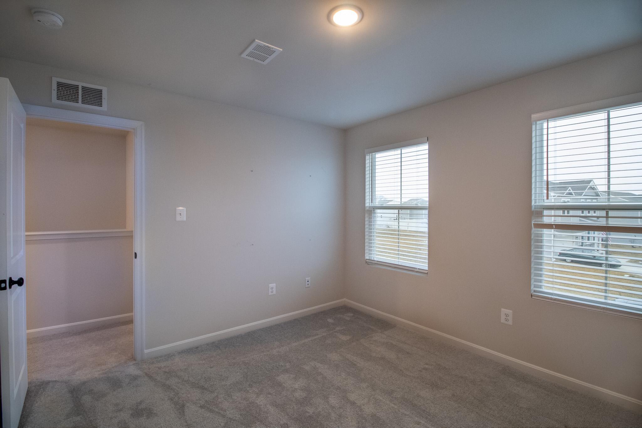 154 Diving Scaup Road Hedgesville, WV 25427 - Photo 51 of 63 Bright and airy room with natural light.