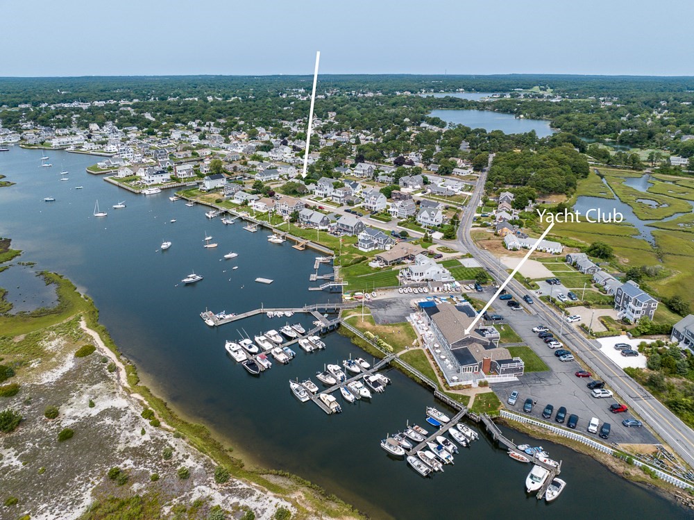 an aerial view of a house with swimming pool