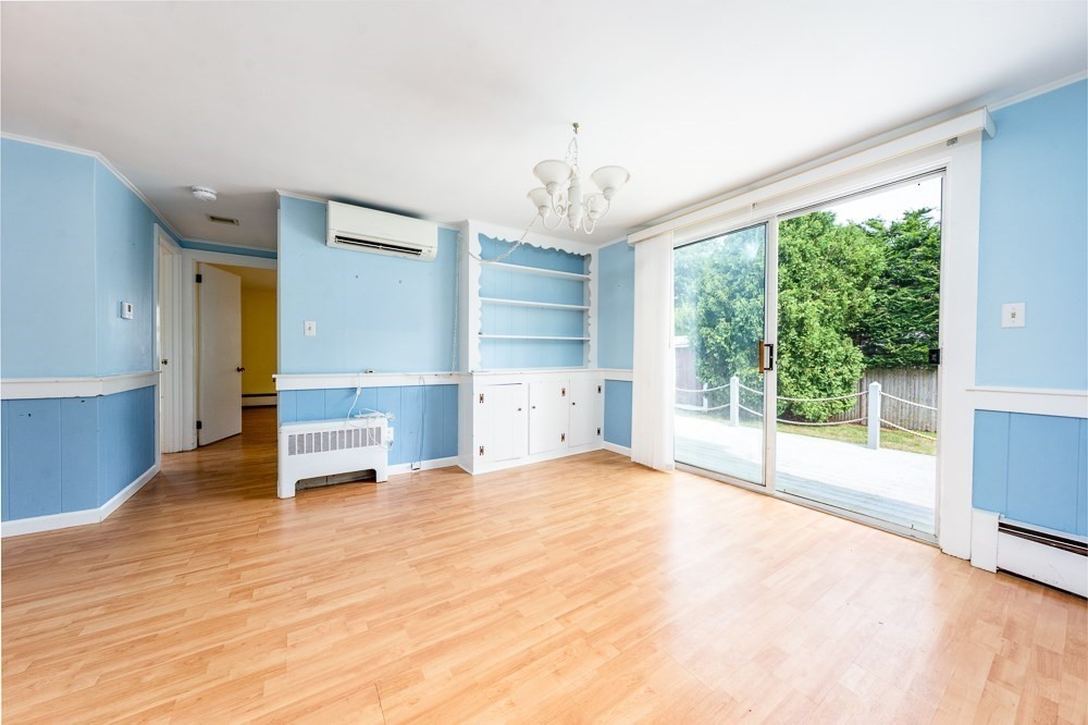 22 Beach View Road Dennis, MA 02670 - Photo 15 of 42 a view of empty room with wooden floor and fan