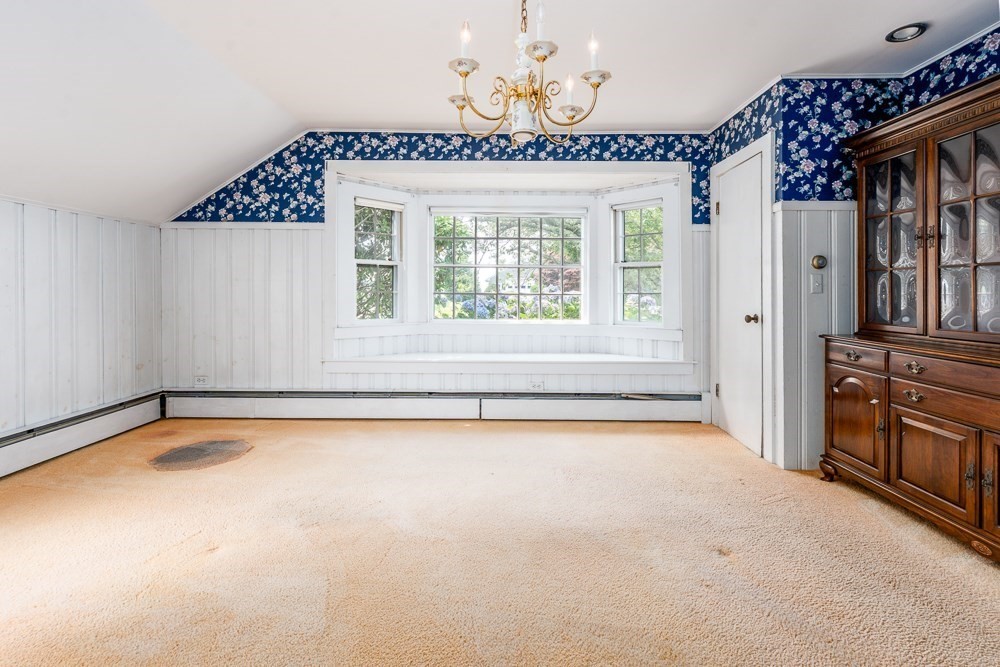 22 Beach View Road Dennis, MA 02670 - Photo 19 of 42 a view of a spacious bathroom with a tub and a large window