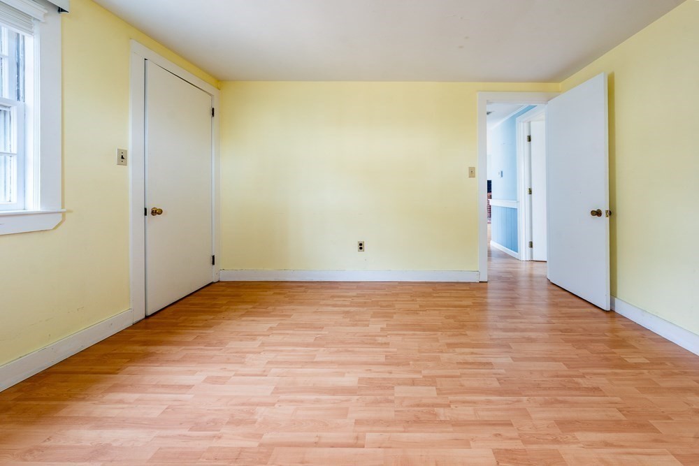 22 Beach View Road Dennis, MA 02670 - Photo 26 of 42 a view of an empty room with wooden floor