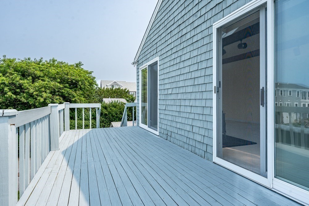 22 Beach View Road Dennis, MA 02670 - Photo 35 of 42 a balcony with wooden floor