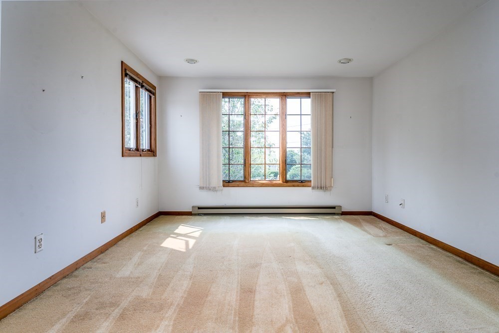 22 Beach View Road Dennis, MA 02670 - Photo 36 of 42 a view of an empty room with a window