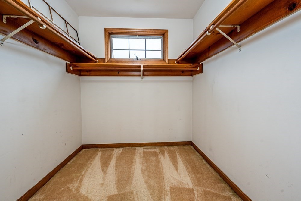 22 Beach View Road Dennis, MA 02670 - Photo 38 of 42 a view of a room with rack on the wall