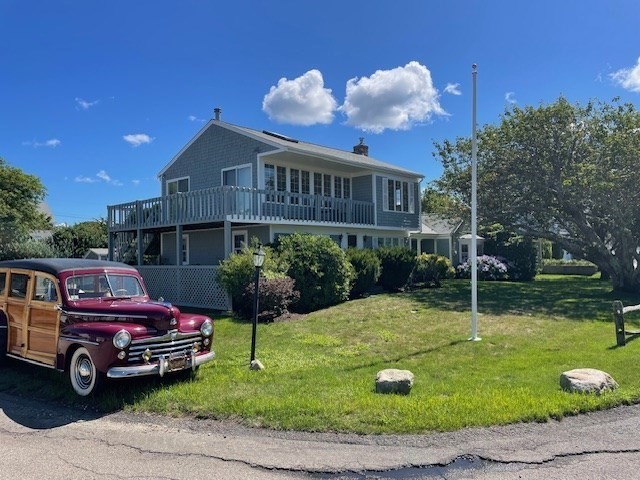 22 Beach View Road Dennis, MA 02670 - Photo 4 of 42 a view of a car in front of house