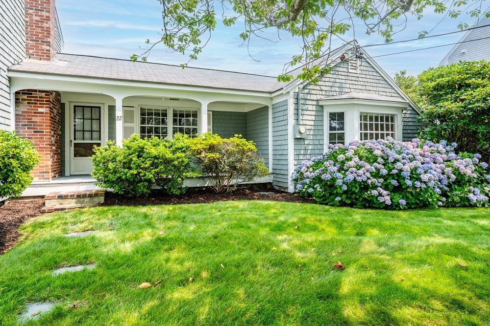 22 Beach View Road Dennis, MA 02670 - Photo 5 of 42 a front view of a house with garden
