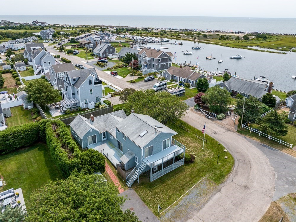 22 Beach View Road Dennis, MA 02670 - Photo 8 of 42 an aerial view of a house with a lake view
