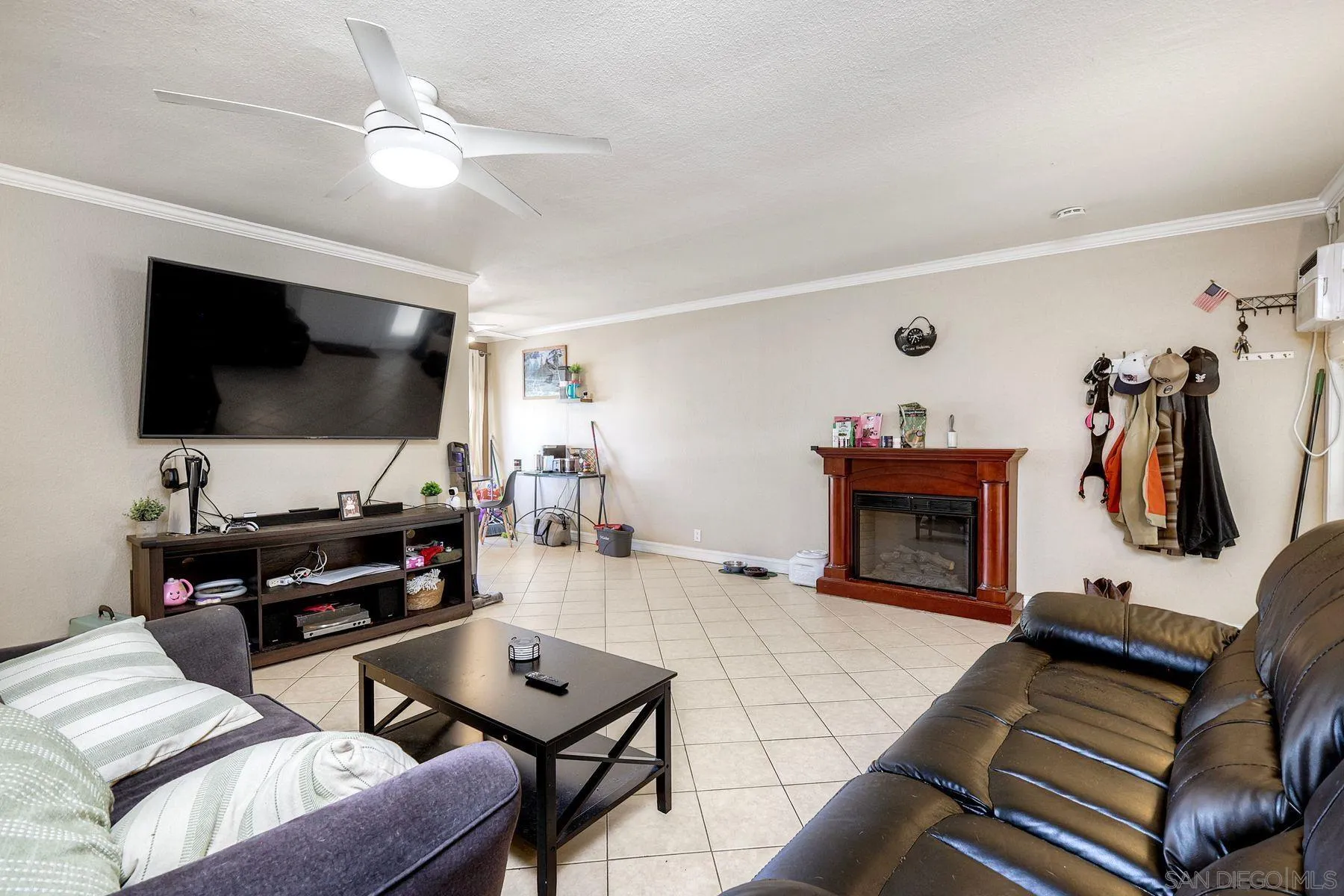 12923 Mapleview Street, Unit 6 Lakeside, CA 92040 - Photo 15 of 25 a living room with furniture and a flat screen tv