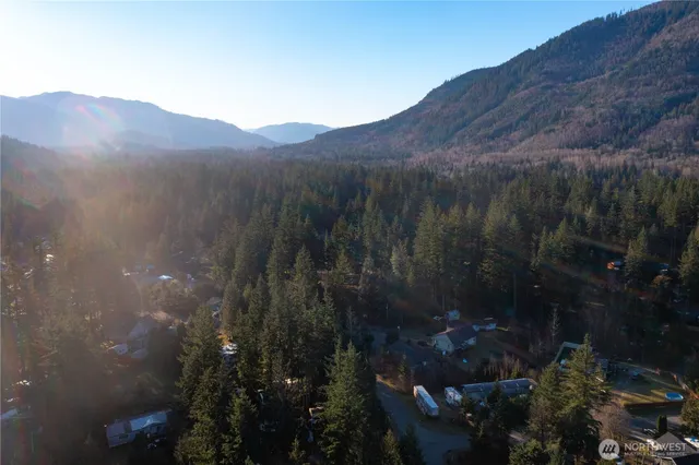 a view of a house with a mountain