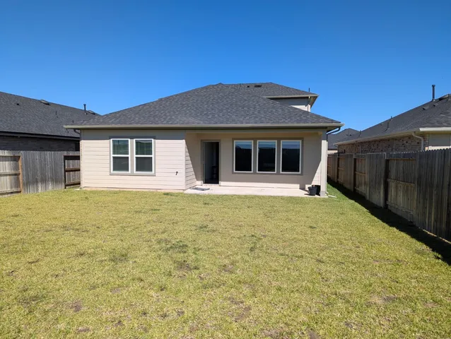 a house with trees in front of it