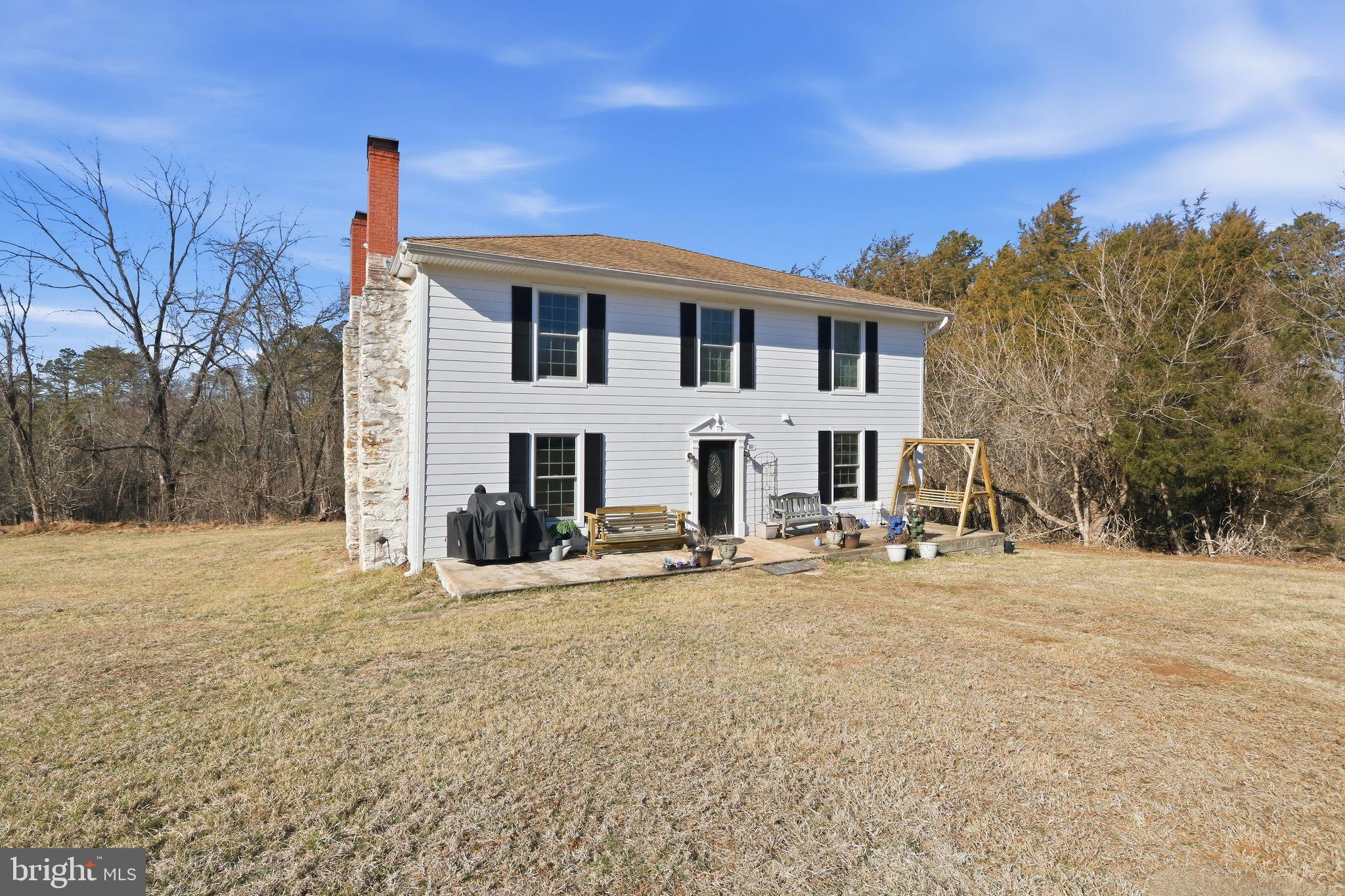 15284 Poplar Road Orange, VA 22960 - Photo 3 of 15 a view of a house with a yard and sitting area