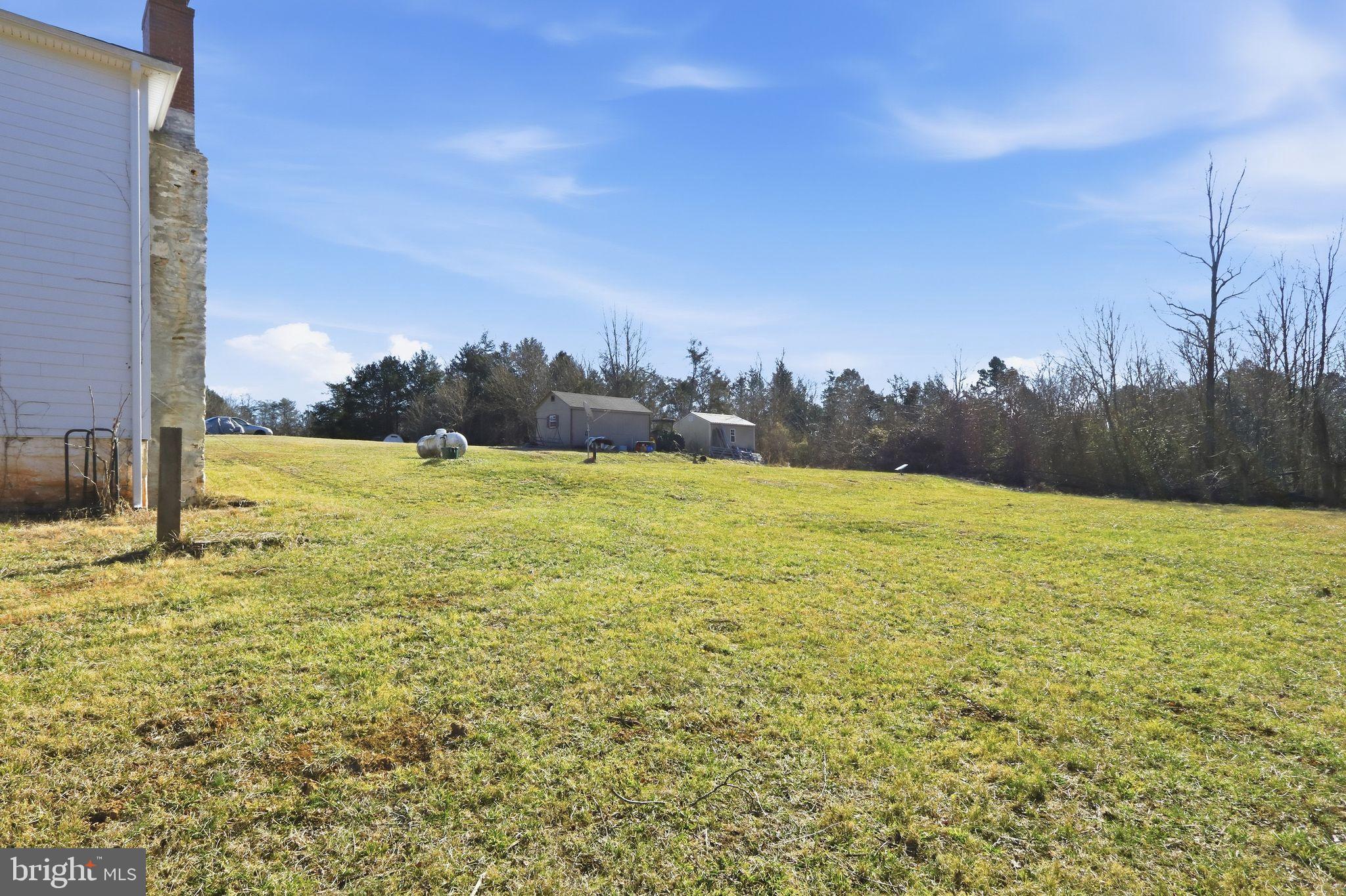 15284 Poplar Road Orange, VA 22960 - Photo 5 of 15 a view of a yard with an ocean view