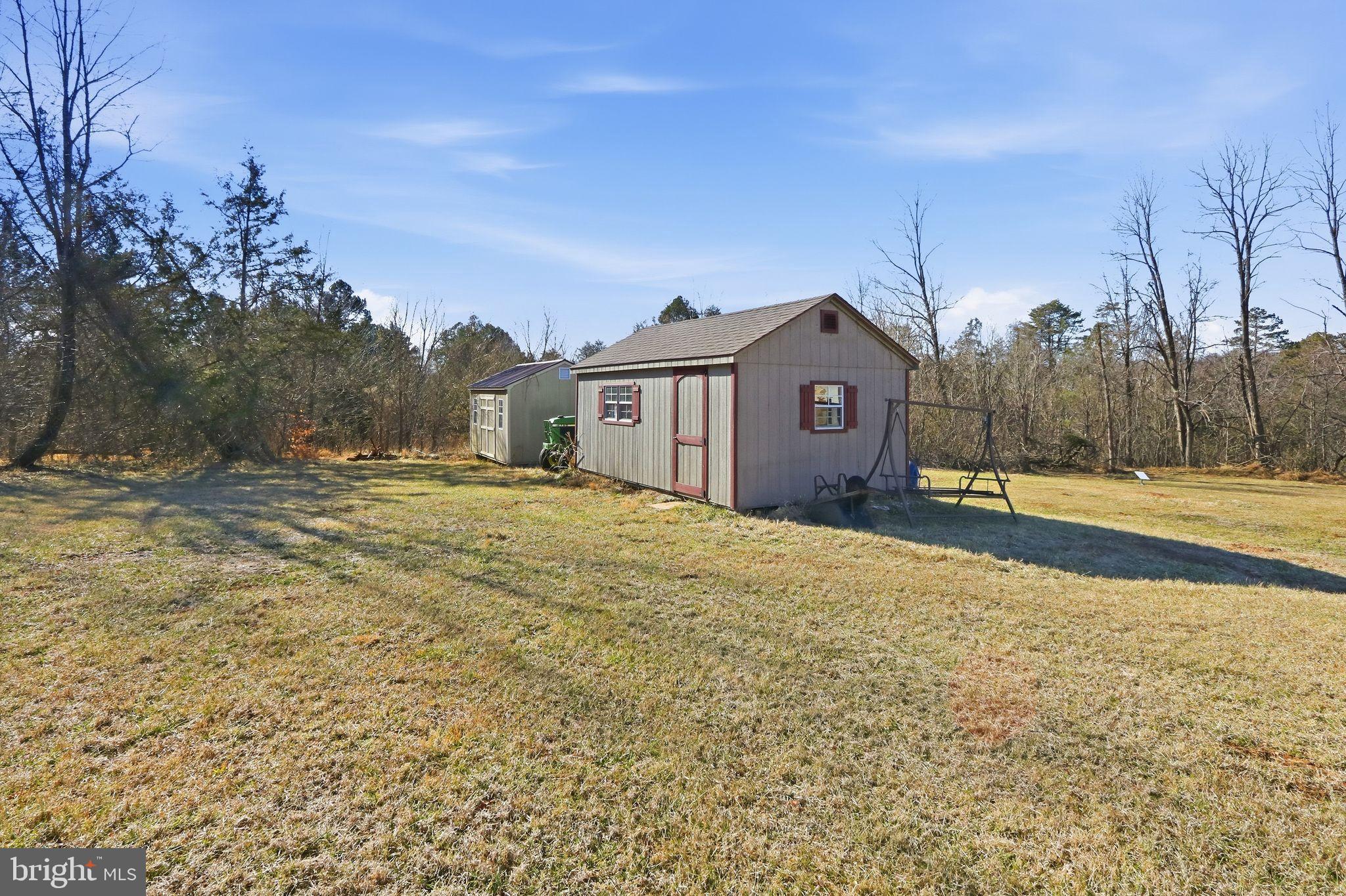 15284 Poplar Road Orange, VA 22960 - Photo 6 of 15 a view of an house with backyard and tree
