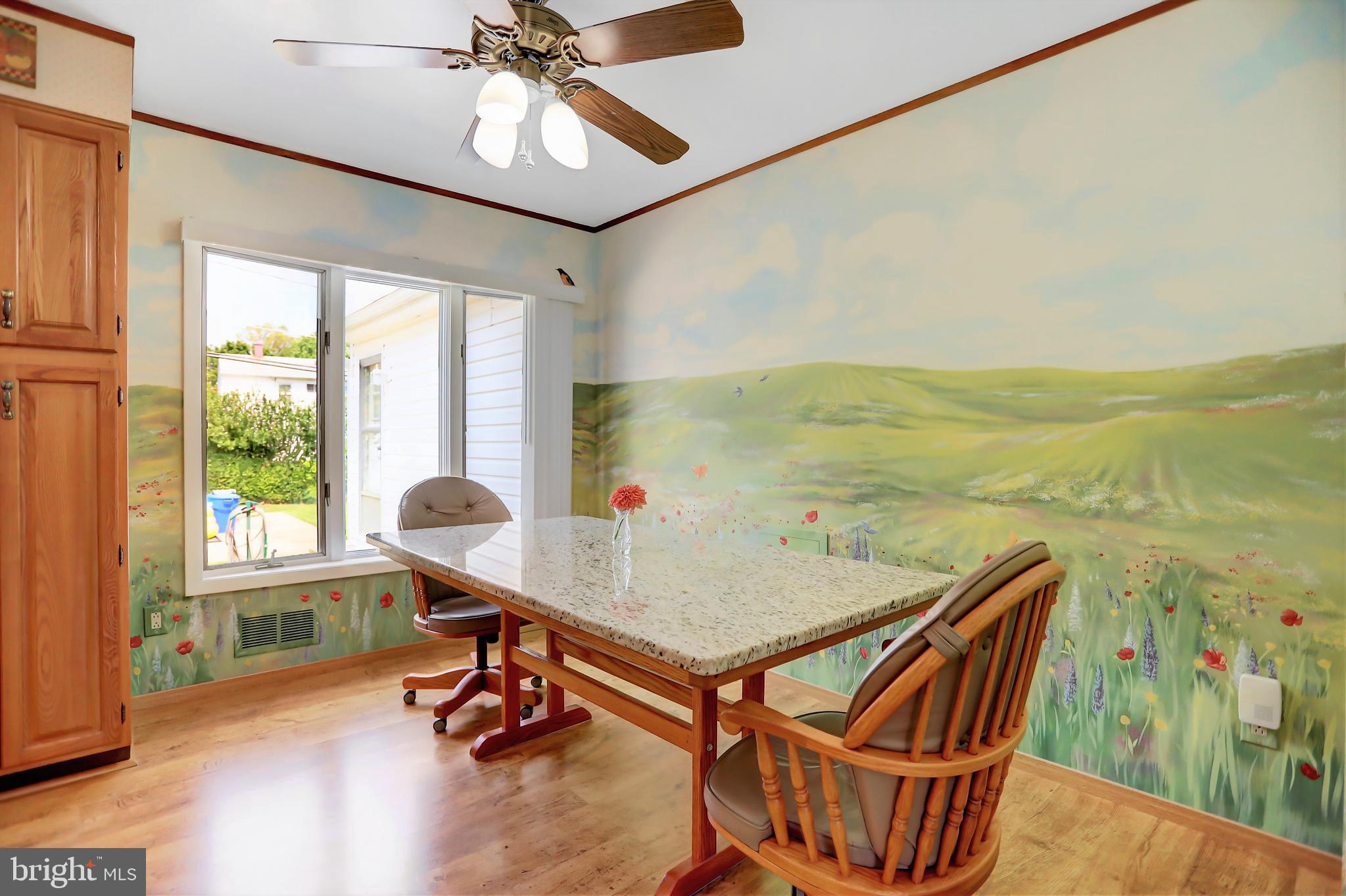 226 Northway Road Reisterstown, MD 21136 - Photo 29 of 47 Custom mural and kitchen table that conveys