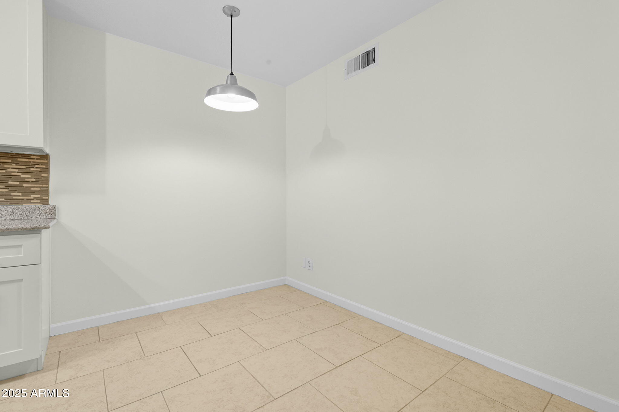 749 East Montebello Avenue, Unit 127 Phoenix, AZ 85014 - Photo 7 of 20 a view of a room with a fan