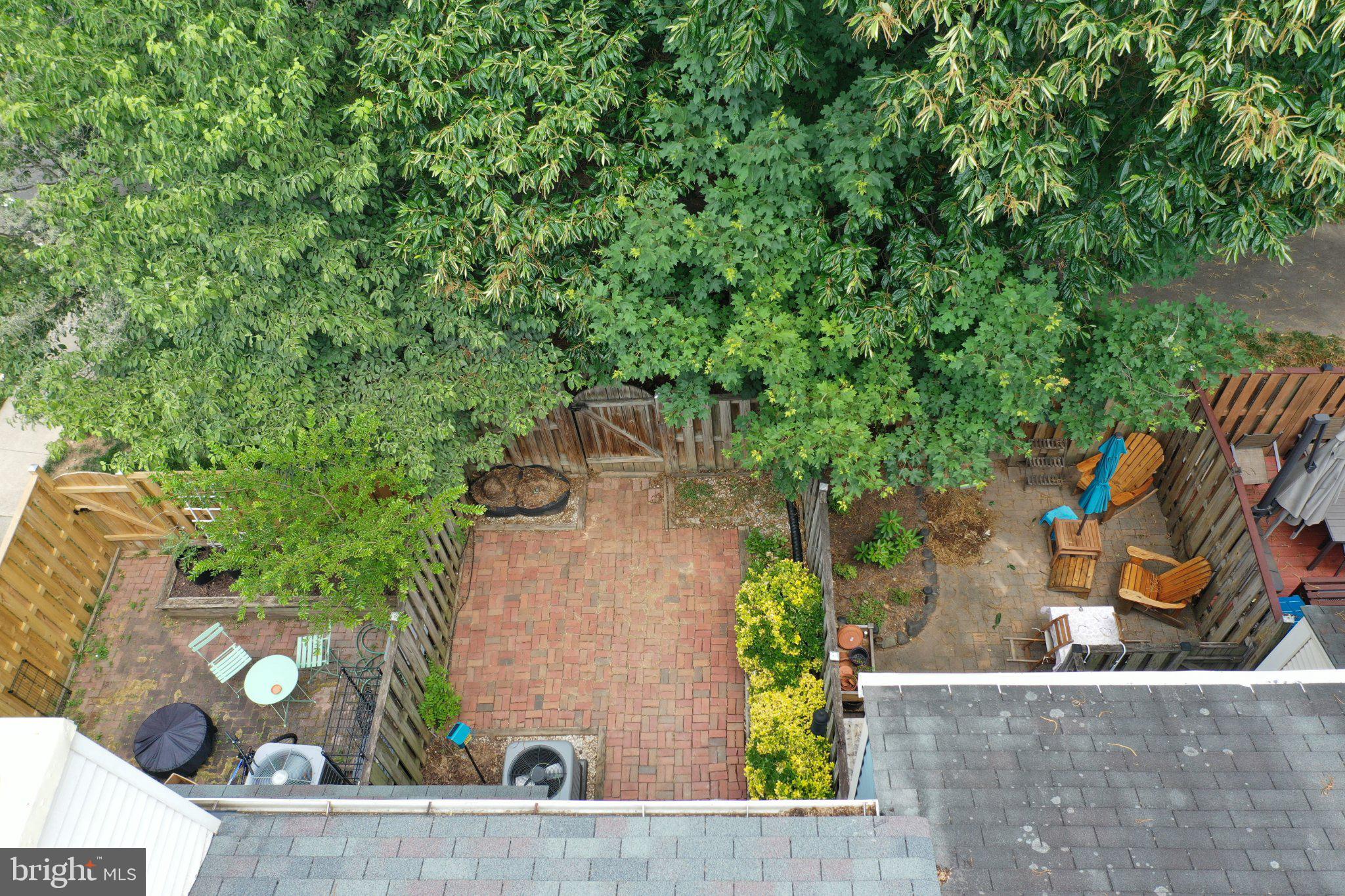 2121 Whisper Way Reston, VA 20191 - Photo 52 of 61 Lush garden retreat with cozy patio.