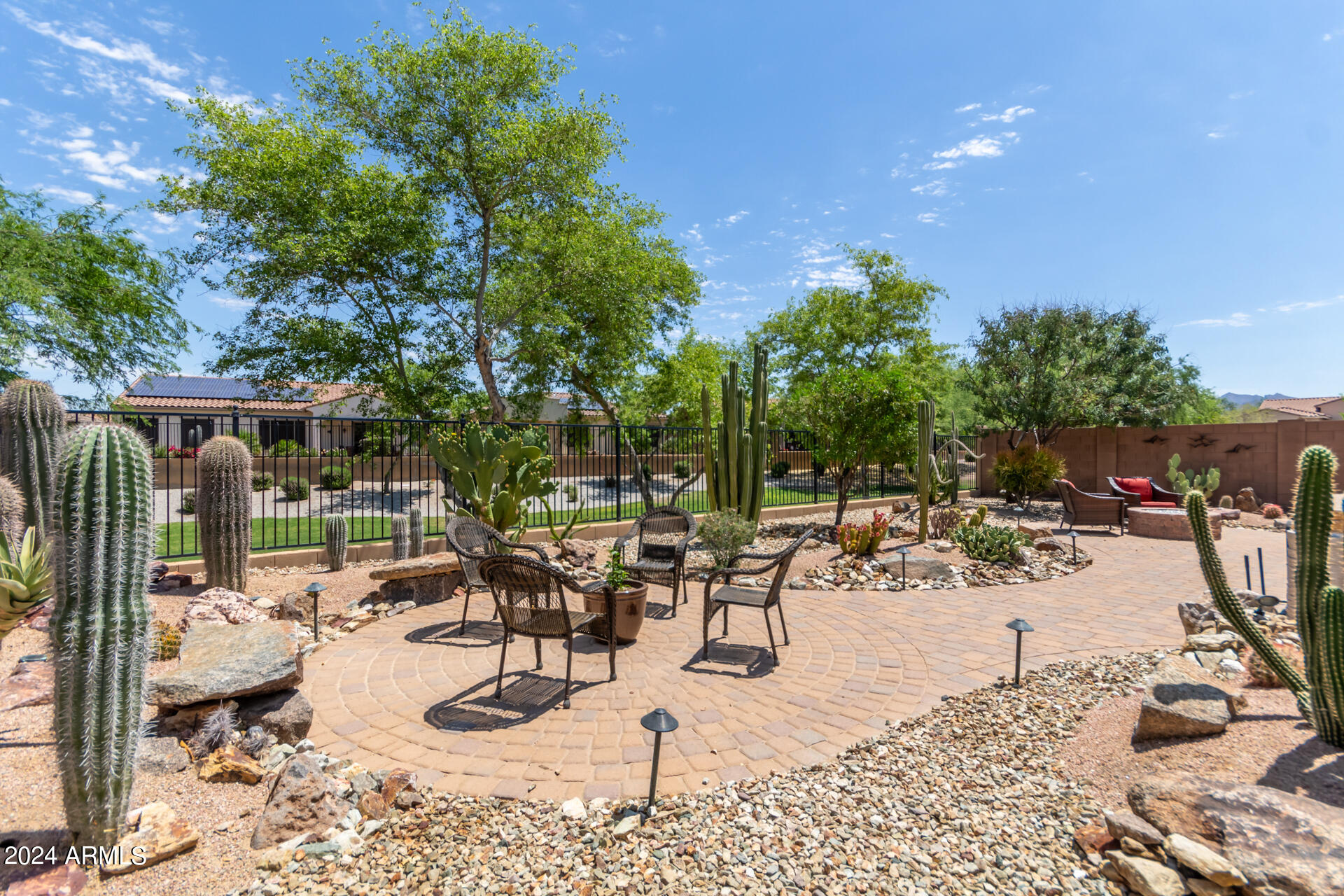 17858 West Verdin Road Goodyear, AZ 85338 - Photo 1 of 78 a view of a backyard with sitting area