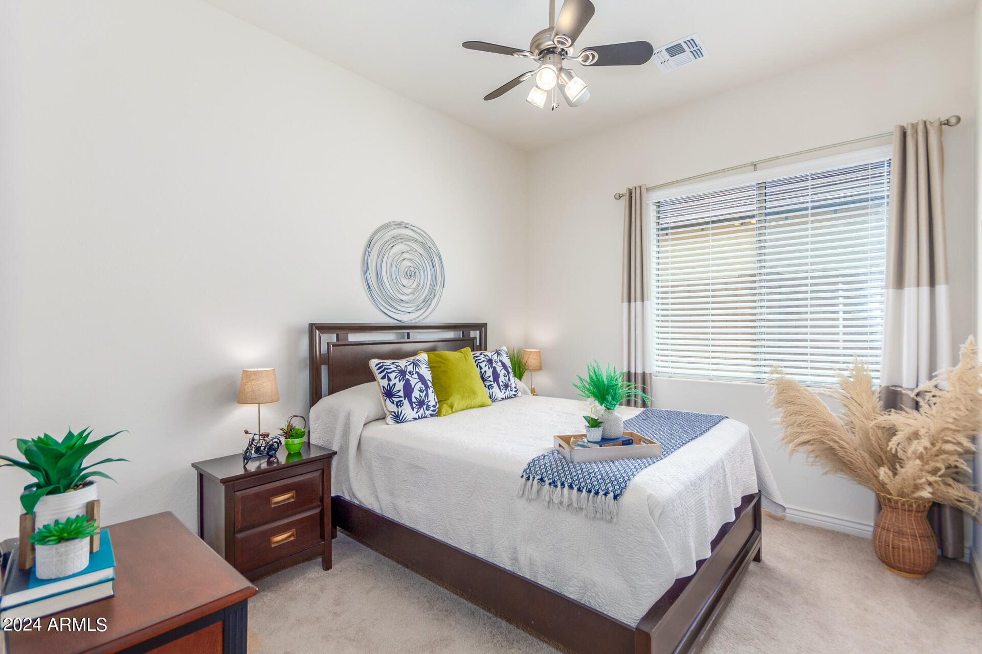 17858 West Verdin Road Goodyear, AZ 85338 - Photo 23 of 78 a bedroom with a bed and window