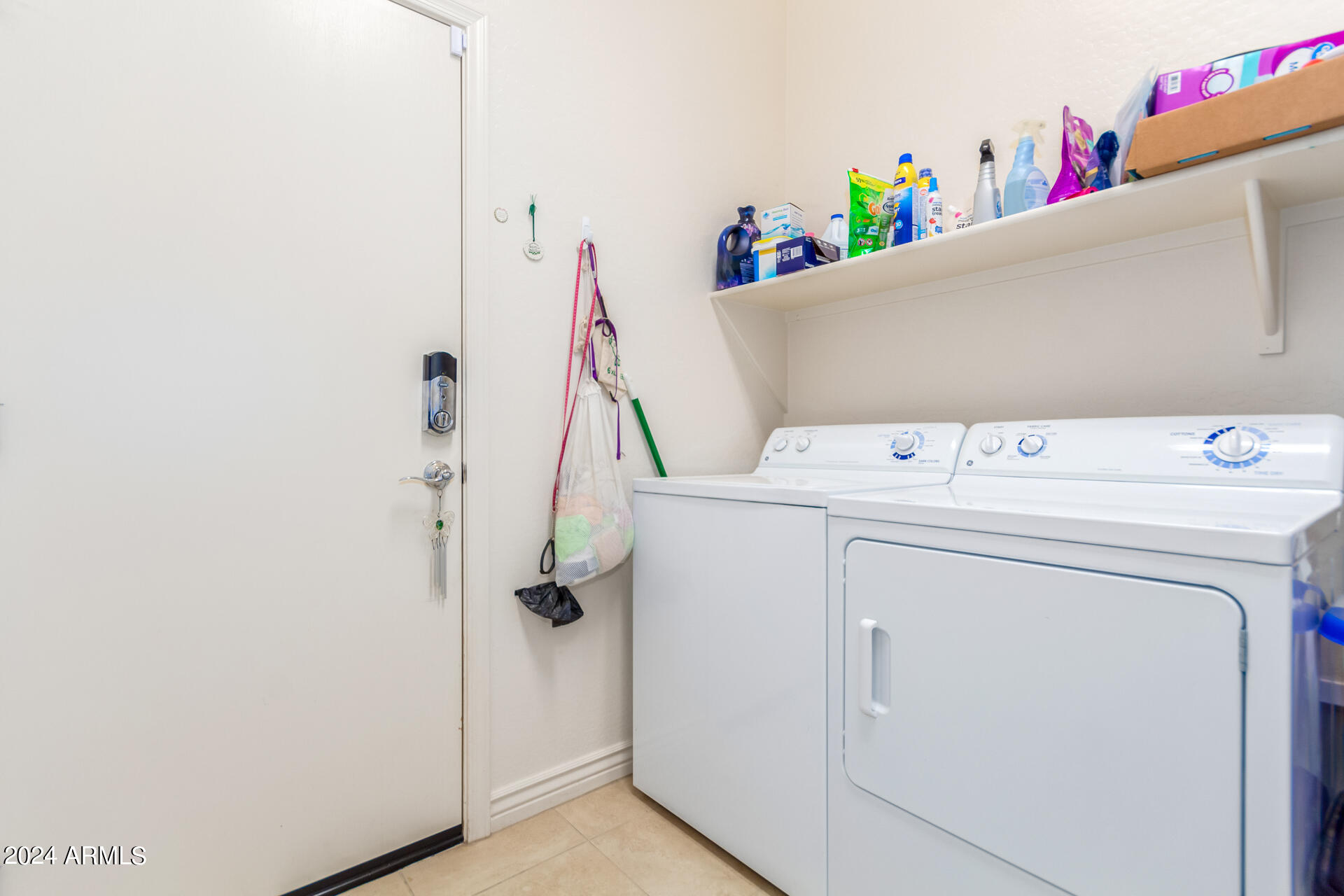 17858 West Verdin Road Goodyear, AZ 85338 - Photo 27 of 78 a utility room with dryer and washer