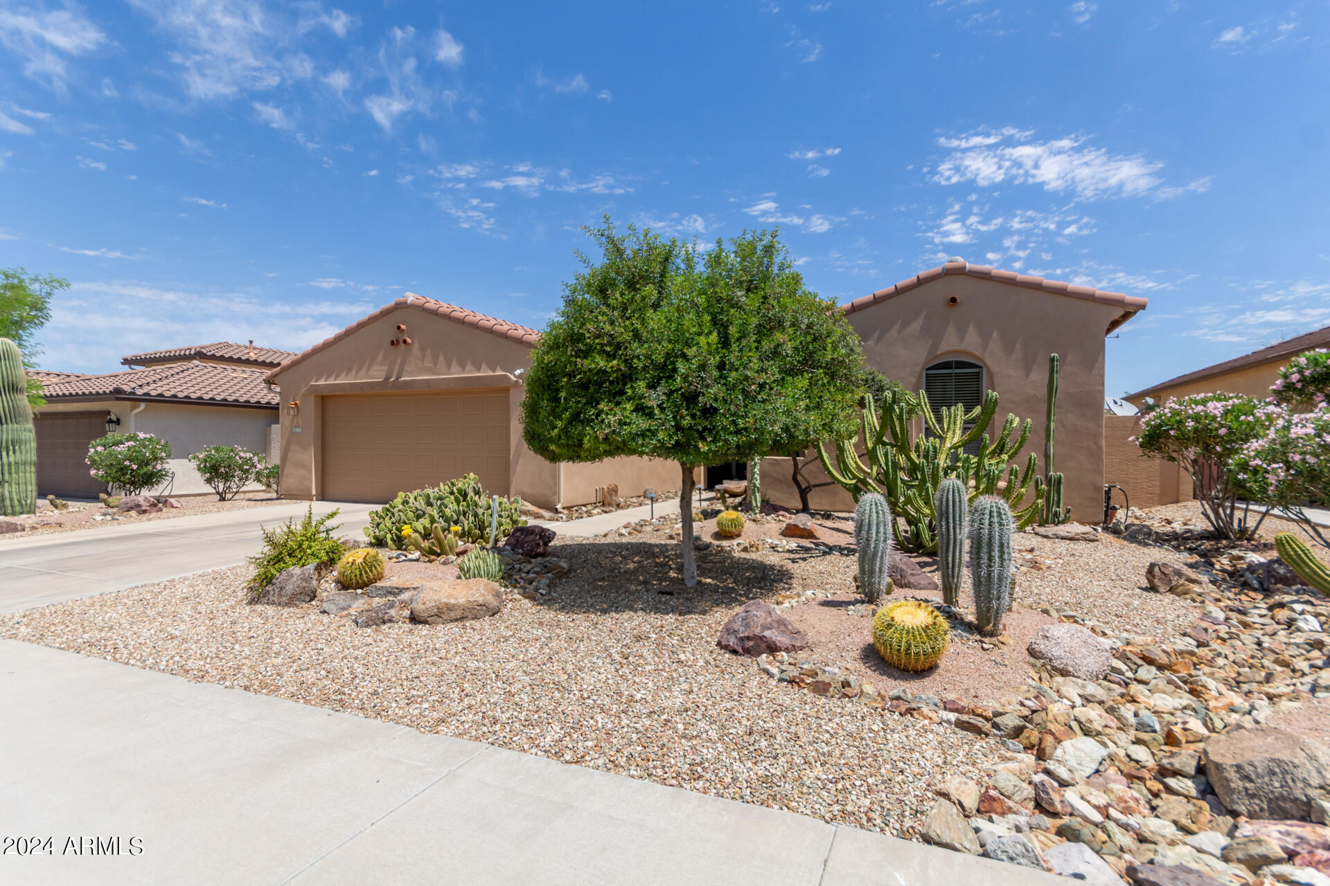 17858 West Verdin Road Goodyear, AZ 85338 - Photo 3 of 78 a view of a house with backyard and sitting area