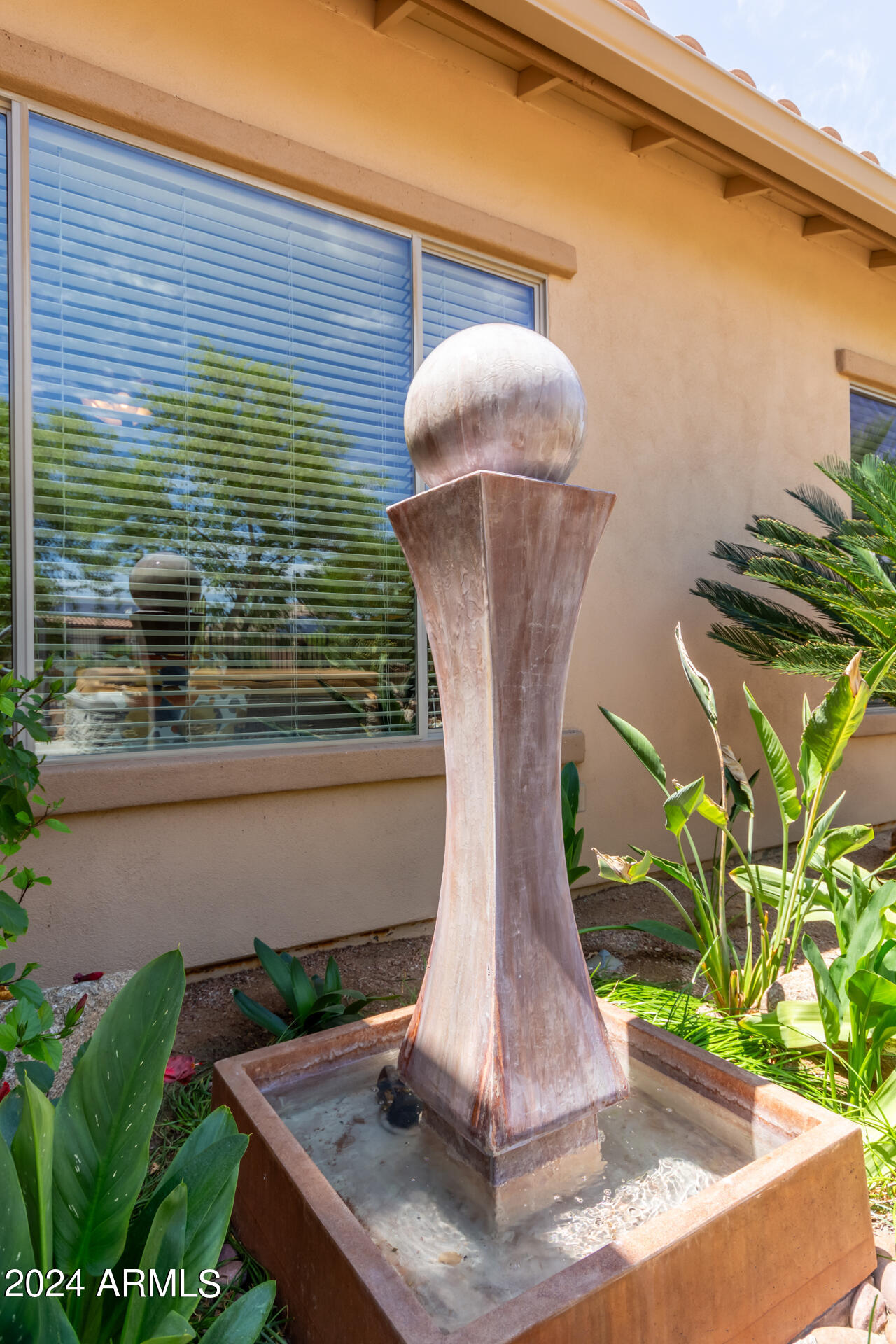 17858 West Verdin Road Goodyear, AZ 85338 - Photo 34 of 78 a vase of flowers sitting on a table