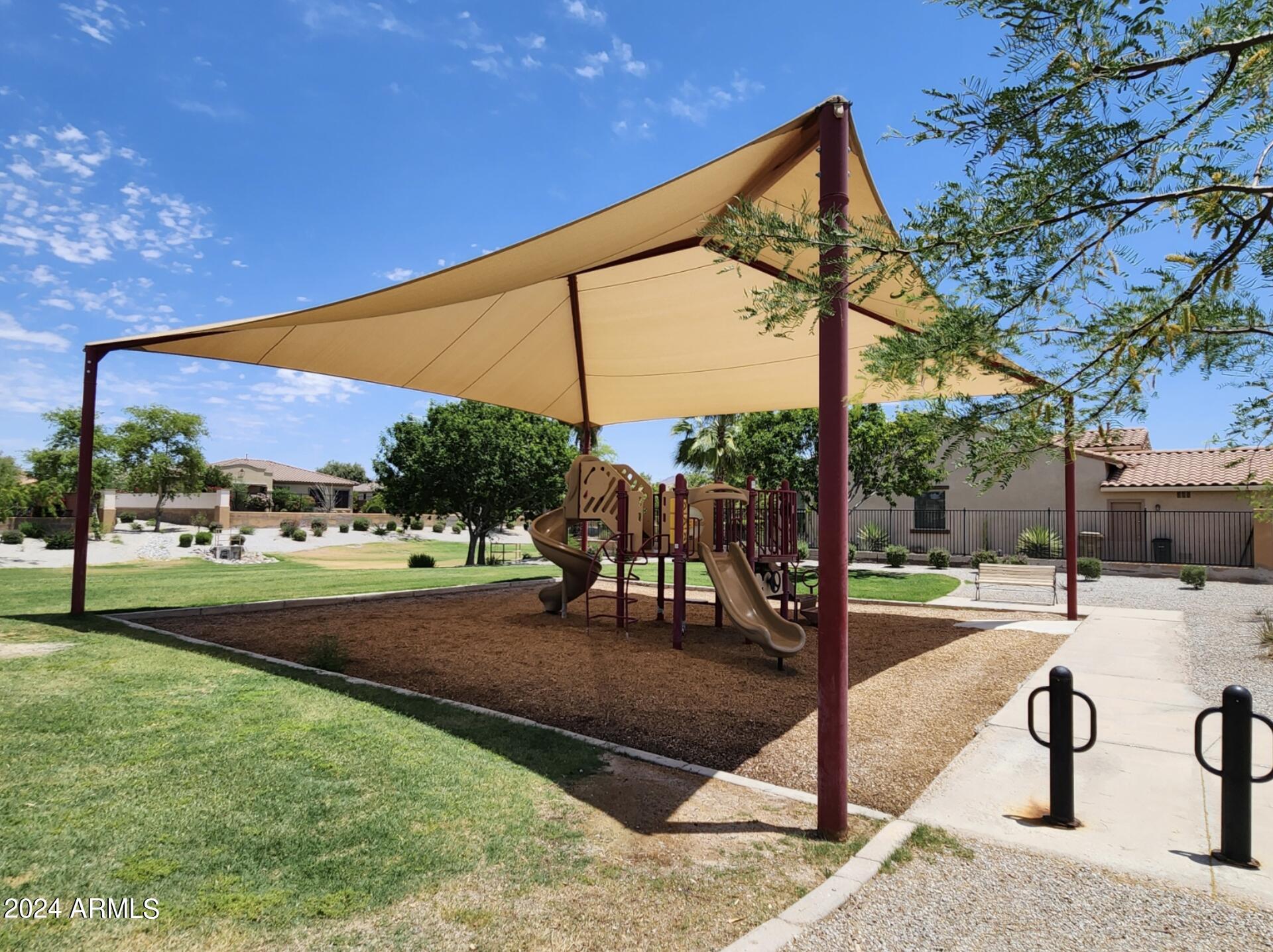 17858 West Verdin Road Goodyear, AZ 85338 - Photo 46 of 78 a outdoor view with a sitting space