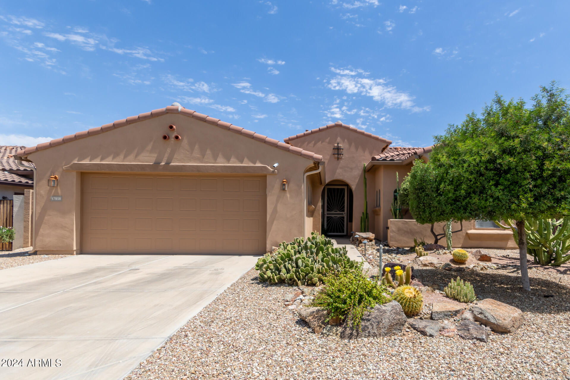 17858 West Verdin Road Goodyear, AZ 85338 - Photo 5 of 78 a front view of a house with a yard