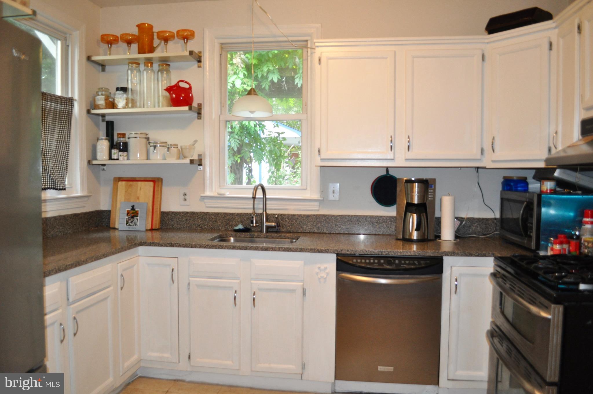 3109 Windom Road Mount Rainier, MD 20712 - Photo 7 of 20 Renovated kitchen with granite and stainless