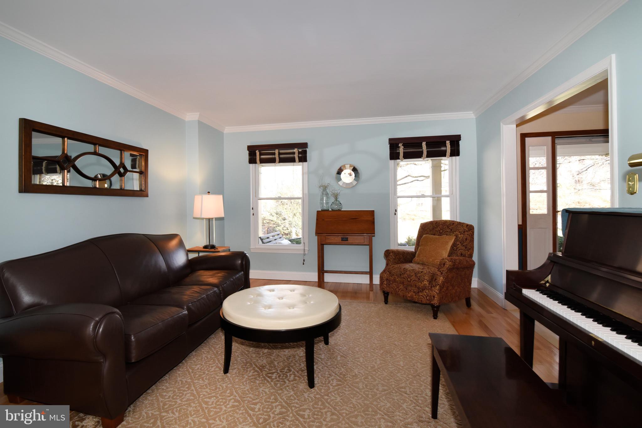 2208 Spinnaker Court Reston, VA 20191 - Photo 7 of 39 a living room with furniture and a flat screen tv