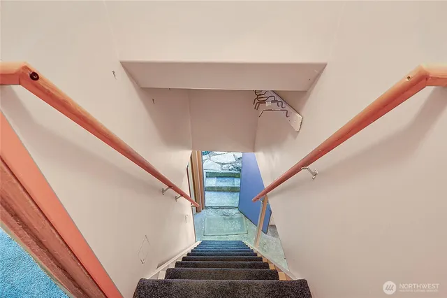 a view of hallway with washer and dryer