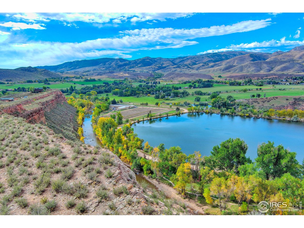 3501 Raptor Ridge Lane Laporte, CO 80535 - Photo 16 of 22 a view of a lake with beach and ocean view