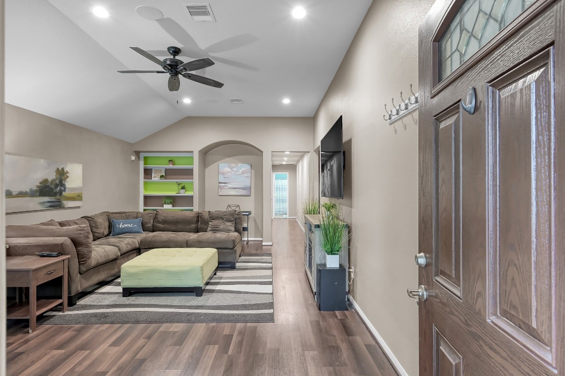 29341 Forest Floor Lane Spring, TX 77386 - Photo 3 of 41 a living room with furniture and a wooden floor