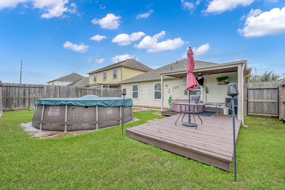 29341 Forest Floor Lane Spring, TX 77386 - Photo 35 of 41 a view of a house with a backyard and a patio