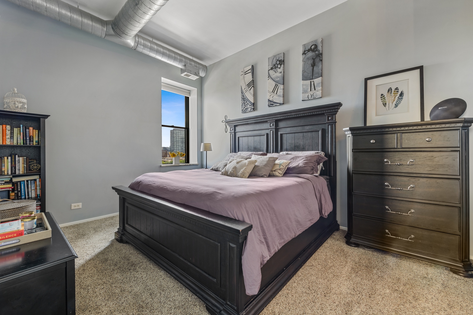 811 South Lytle Street, Unit 606 Chicago, IL 60607 - Photo 13 of 23 a bedroom with a bed and a television