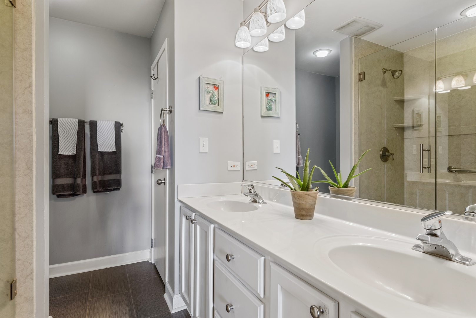 811 South Lytle Street, Unit 606 Chicago, IL 60607 - Photo 16 of 23 a bathroom with a double vanity sink and a mirror