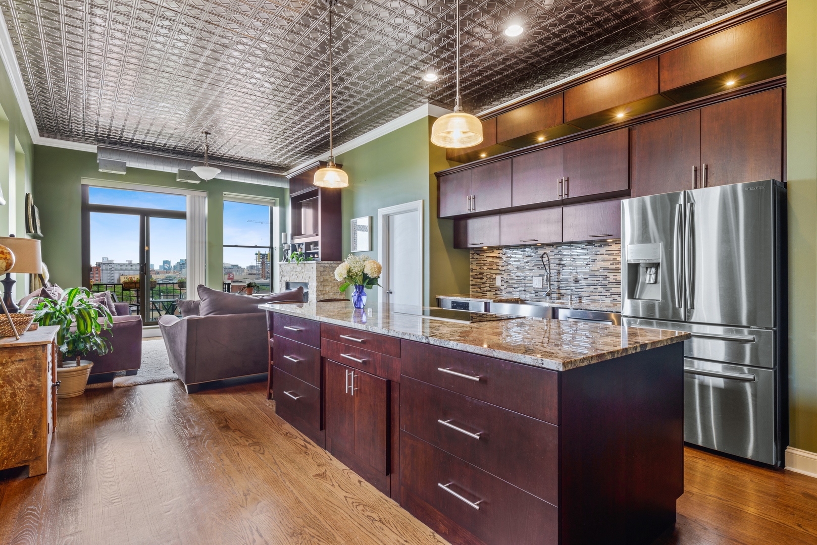 811 South Lytle Street, Unit 606 Chicago, IL 60607 - Photo 5 of 23 a kitchen with stainless steel appliances granite countertop a refrigerator a sink dishwasher stove and oven